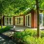 Беседка-барбекю (50 кв.м) в кантри стиле выполнена из деревянного бруса