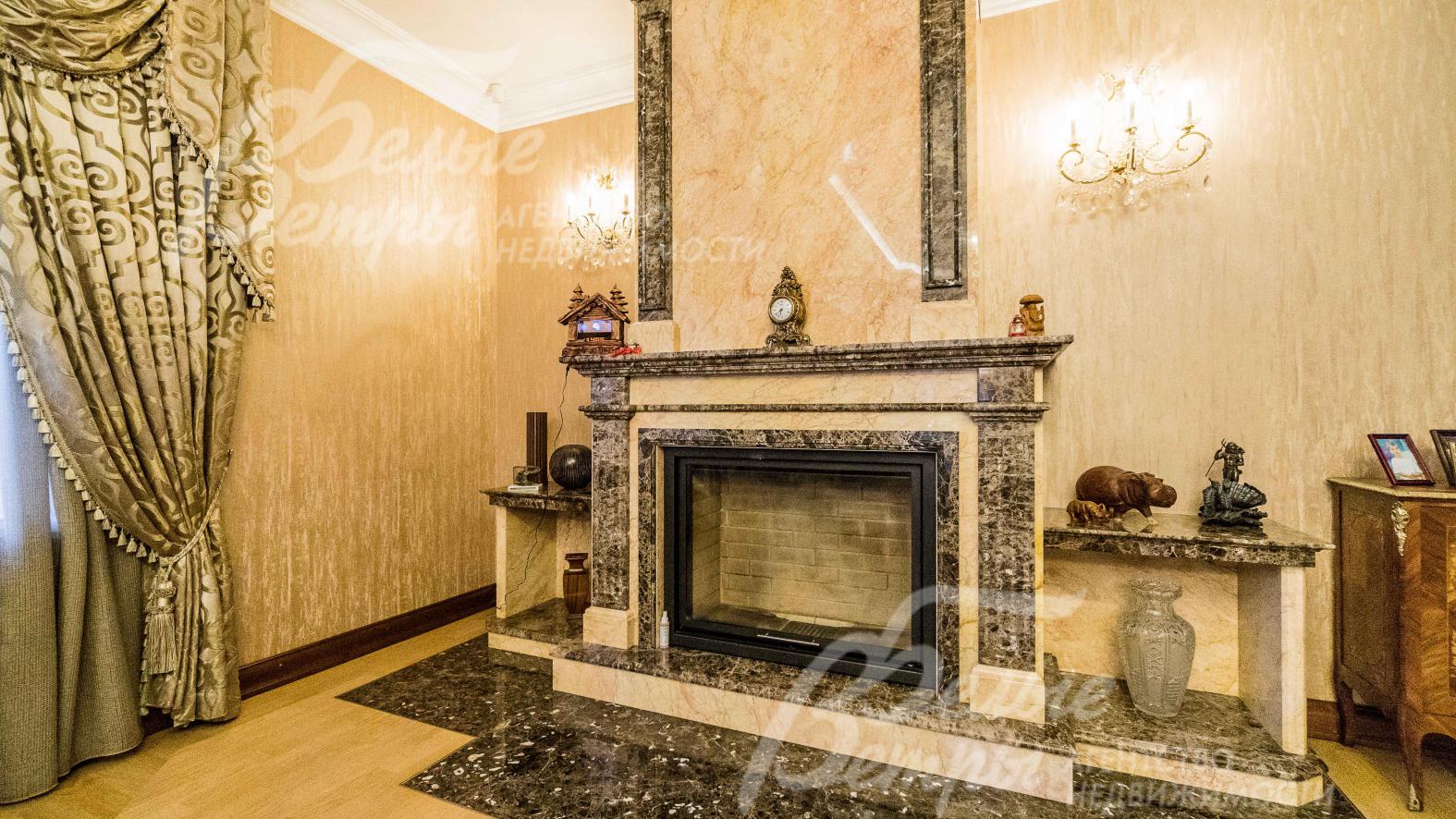 Камин из мрамора  Emperador Dark и Crema-Marfil