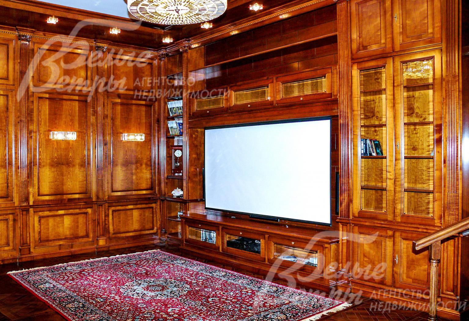 Кинотеатр-кабинет 43,9 кв.м. В кинотеатре установлен 3D проектор с авто выдвижным экраном и профессиональной звуковой системой.