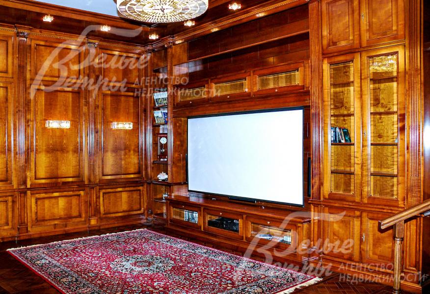 Кинотеатр-кабинет 43,9 кв.м. В кинотеатре установлен 3D проектор с авто выдвижным экраном и профессиональной звуковой системой.