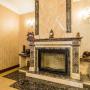 Камин из мрамора  Emperador Dark и Crema-Marfil