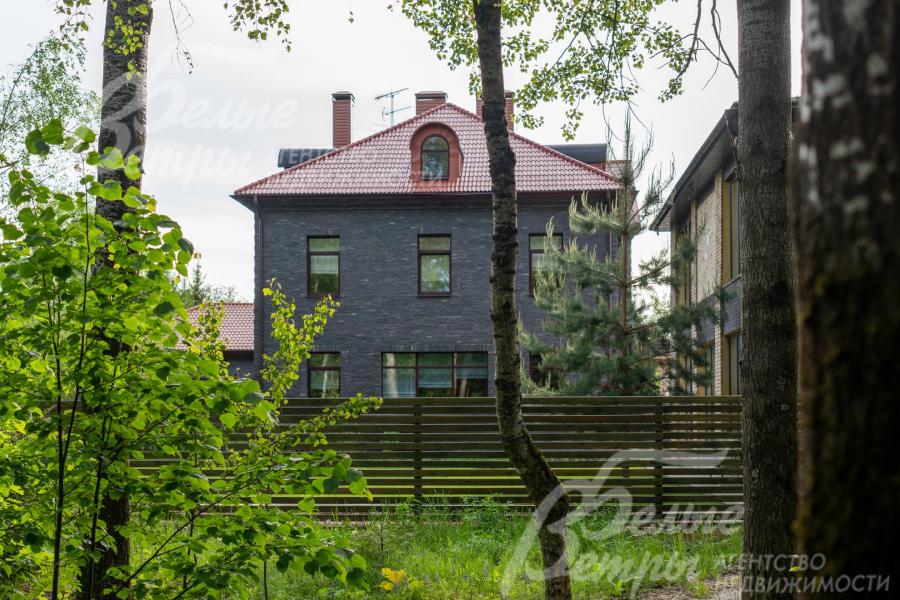 Монолитно-кирпичный дом в стиле современной английской усадьбы